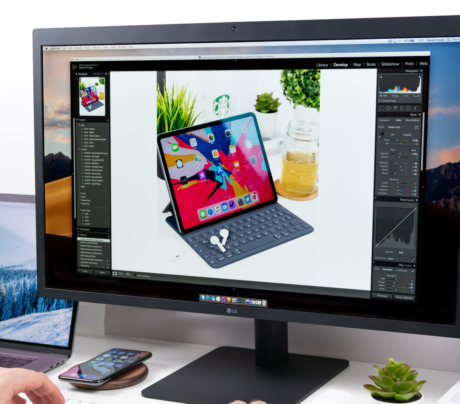 Person editing an image on a desktop computer