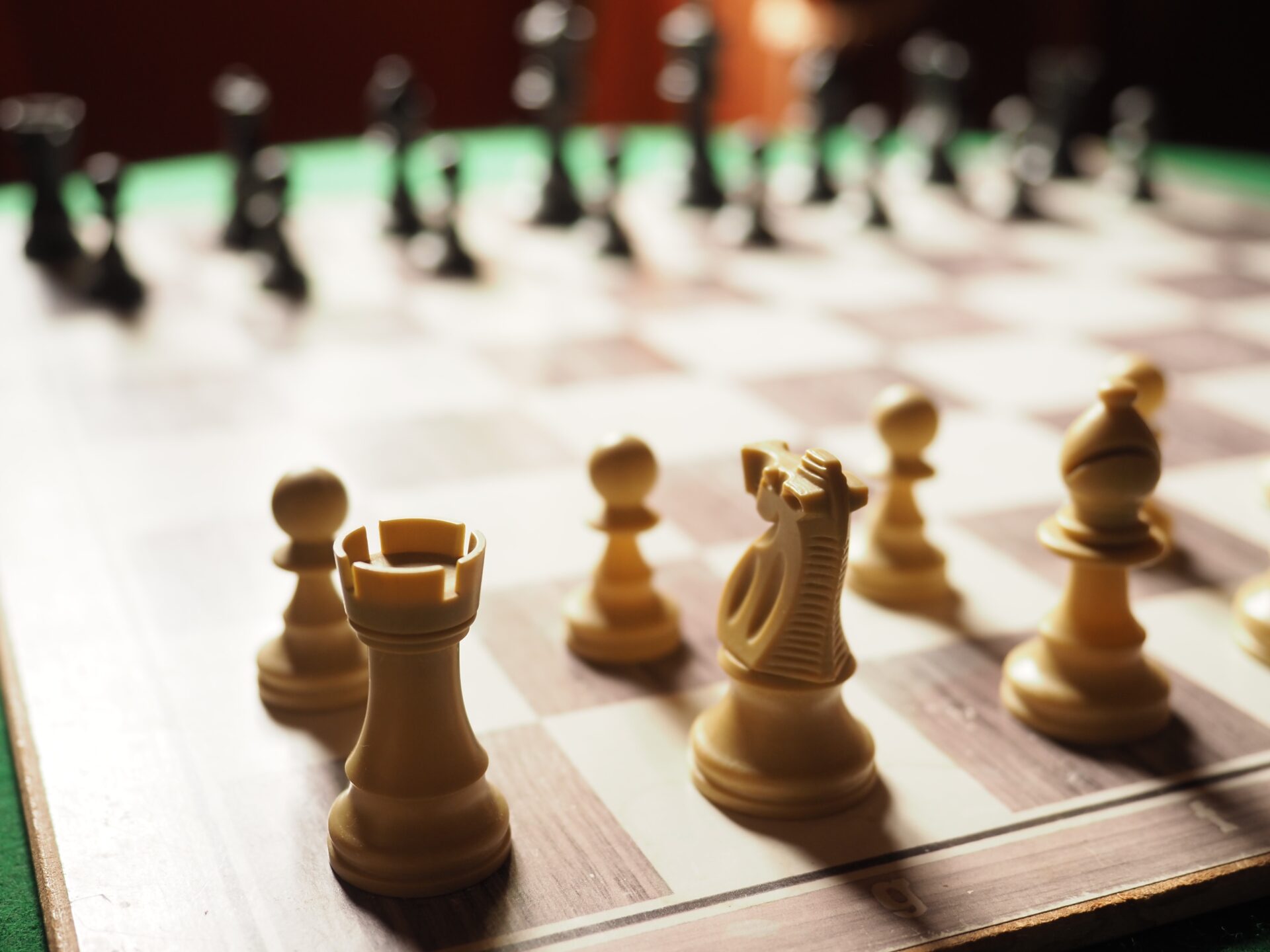 a chess board full of pieces