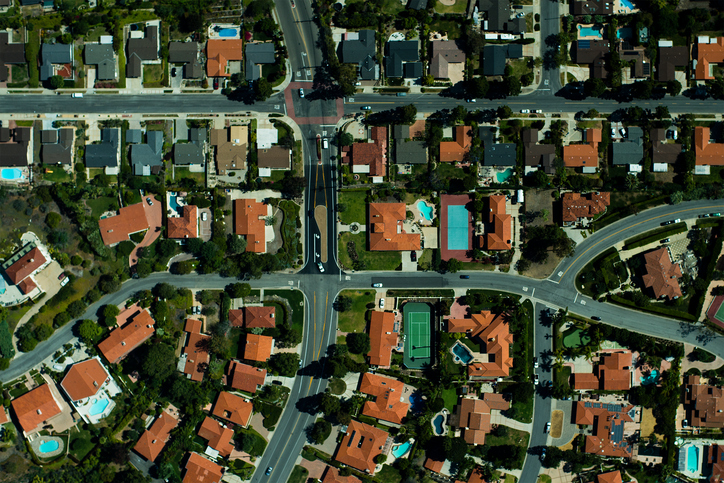 An aerial view of suburbian housing and garden